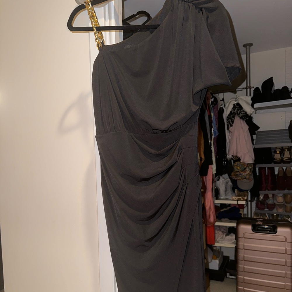 Brand new flattering black dress. Never worn